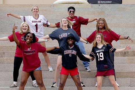 Orientation Leaders dancing in front of Long Street Theatre