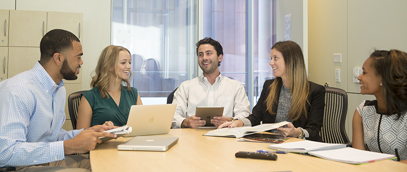 students studying at business school