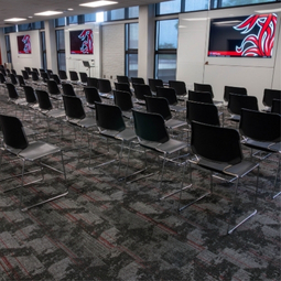 Chairs and Tech Walls