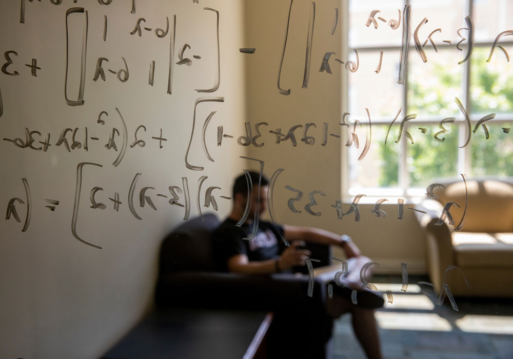 An Honors College student seen studying in the Honors residence hall.