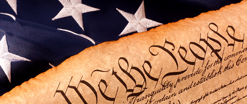 Declaration of Independence overlaying a United States flag