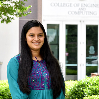 Fahira Mir stands outside Swearingen building