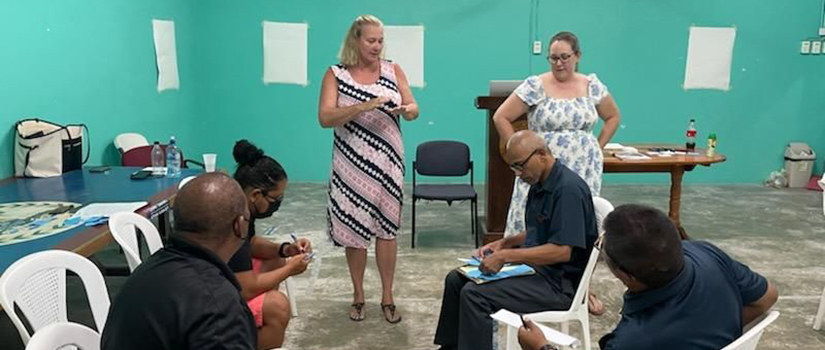 Lori Pennington-Gray speaks to tourism officials in Belize.