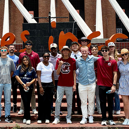 Students pose for a photo while visiting Mexico City