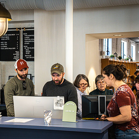 Individuals at All Good Books bookstore