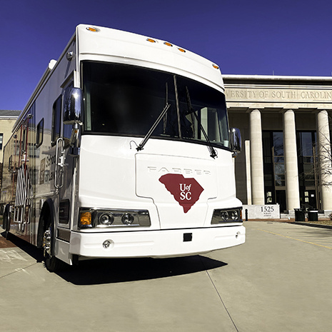 Palmetto Leader in front of USC Law School Building