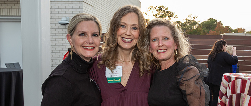 three females smiling 