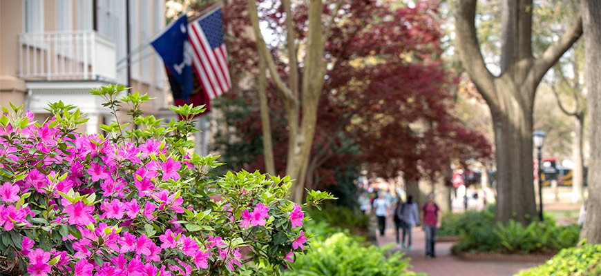 flowers and the USC president's house in the background