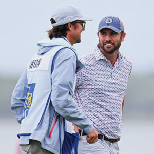 George Bryan IV and Wesley Bryan on a golf course.