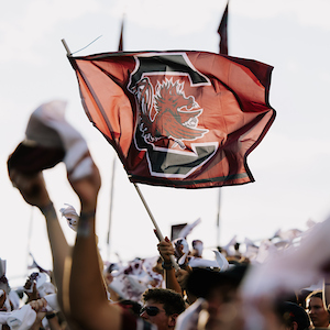 garnet South Carolina flag in the student section at Williams-Brice Stadium