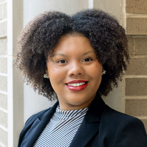 Portrait of public health senior Ebony Christie outside the Arnold School