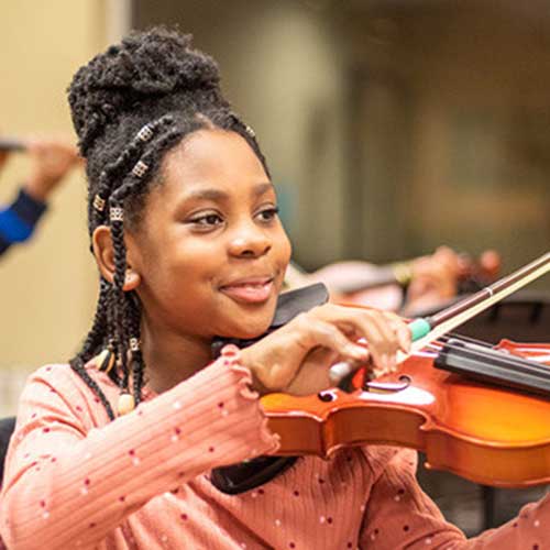 Student playing violin