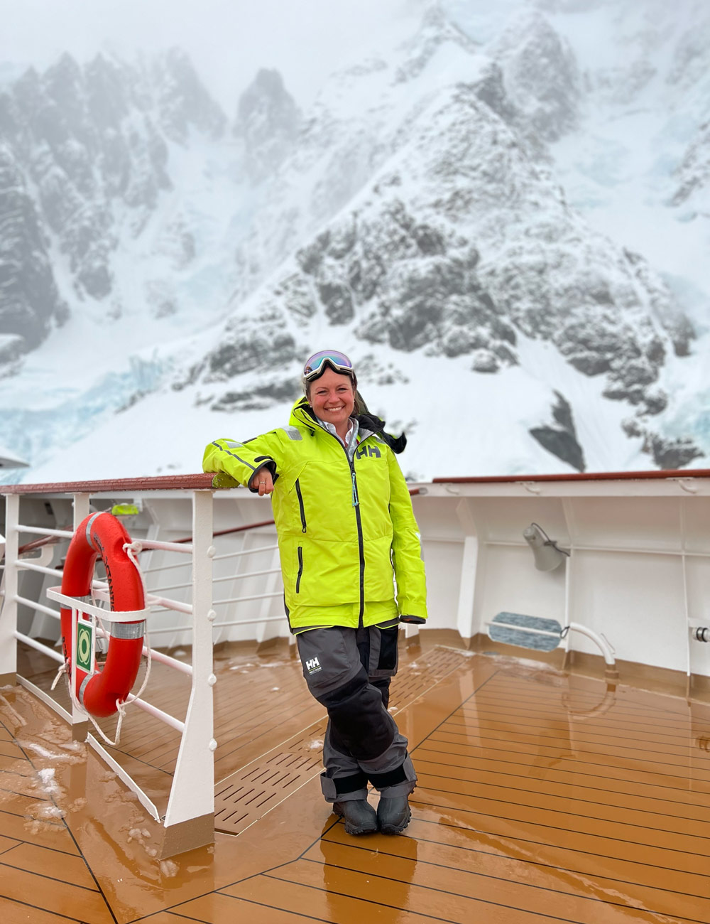 Brandi Revels on a ship’s deck in Antarctica.